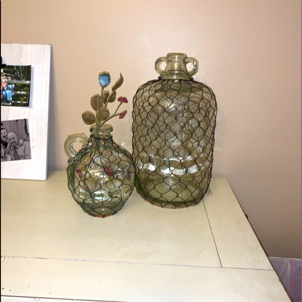 2 glass jugs with metal wire accent